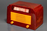 DeWald A-502 ’Step-Top” in Oxblood + Yellow Insert Grille Catalin Radio